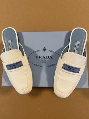 Prada Cream Loafers with Blue Logo Panel